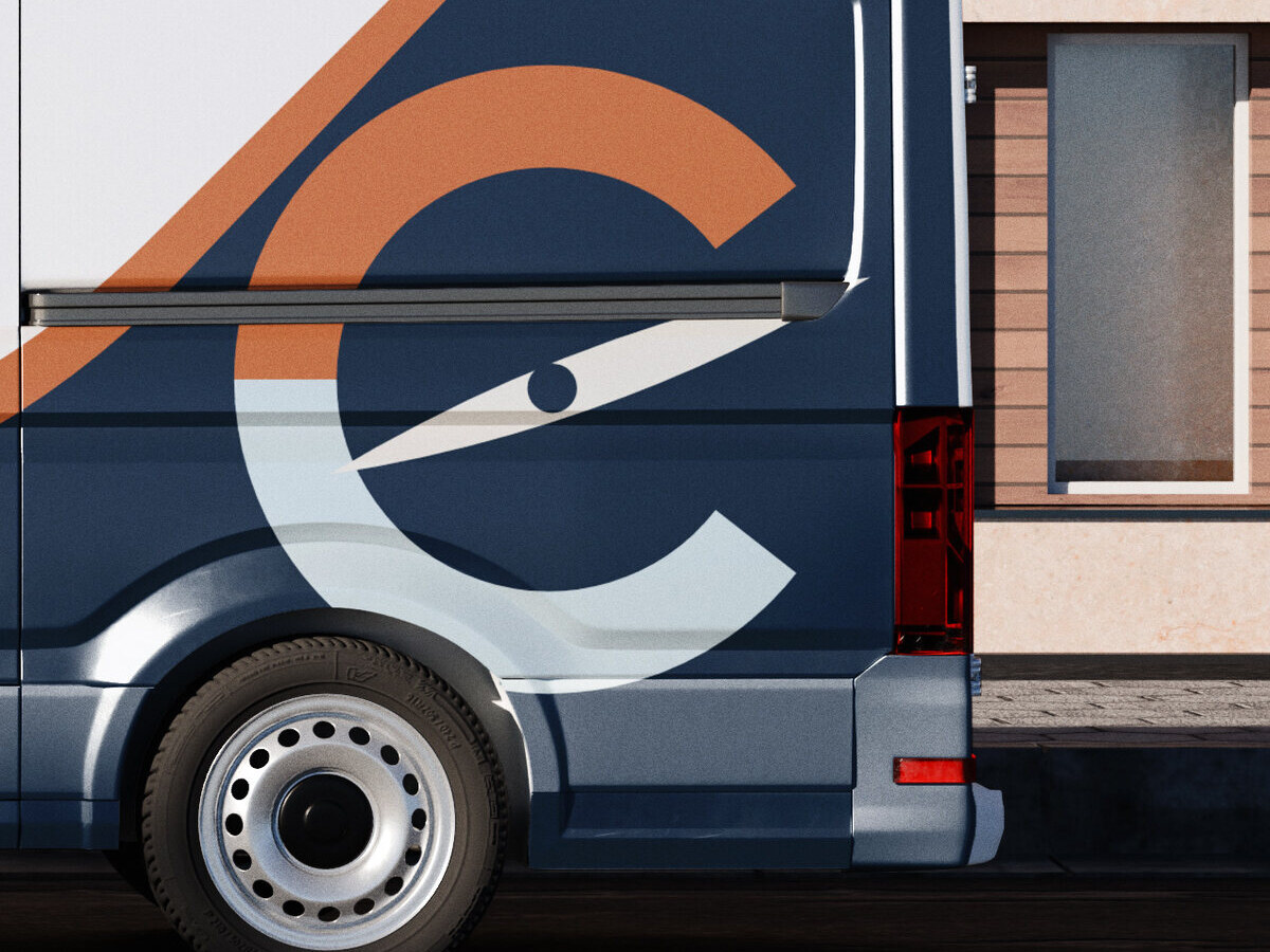 Concept brand: Corvane Heating & Air (fictional). The Corvane mark on the rear quarter of a cargo van, in the livery we designed.